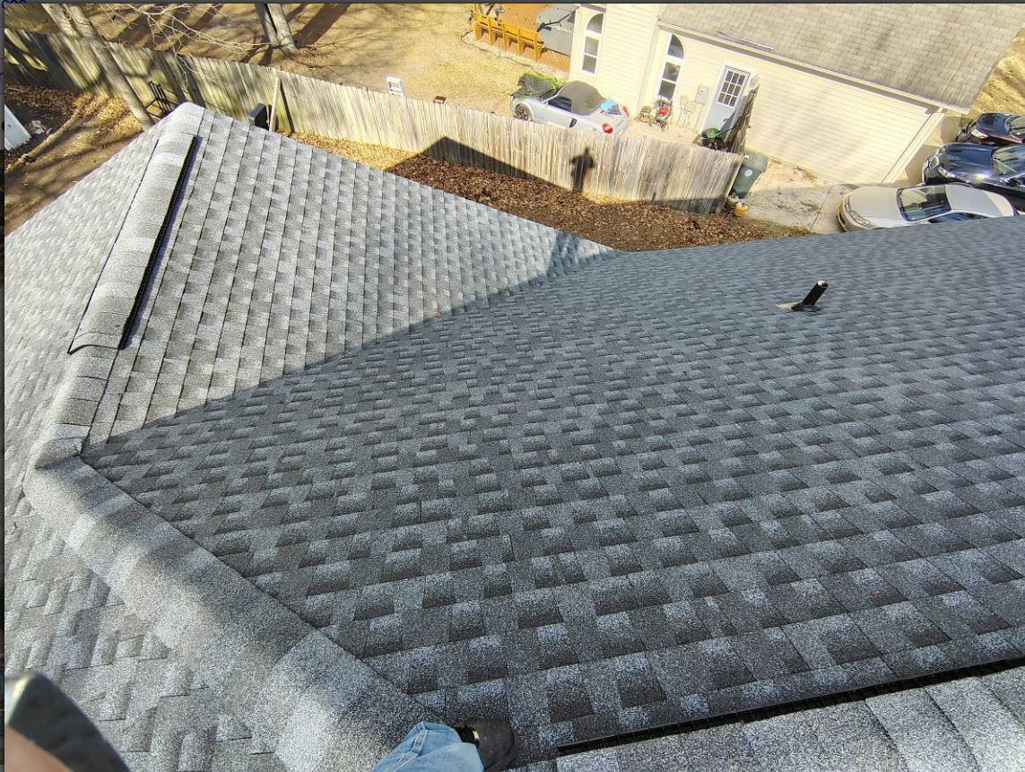 Overhead view of a completed shingle roof