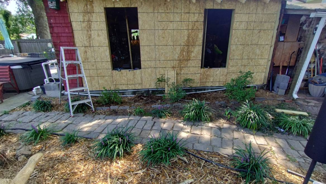Structure re-sheathed with new plywood during a carpentry repair