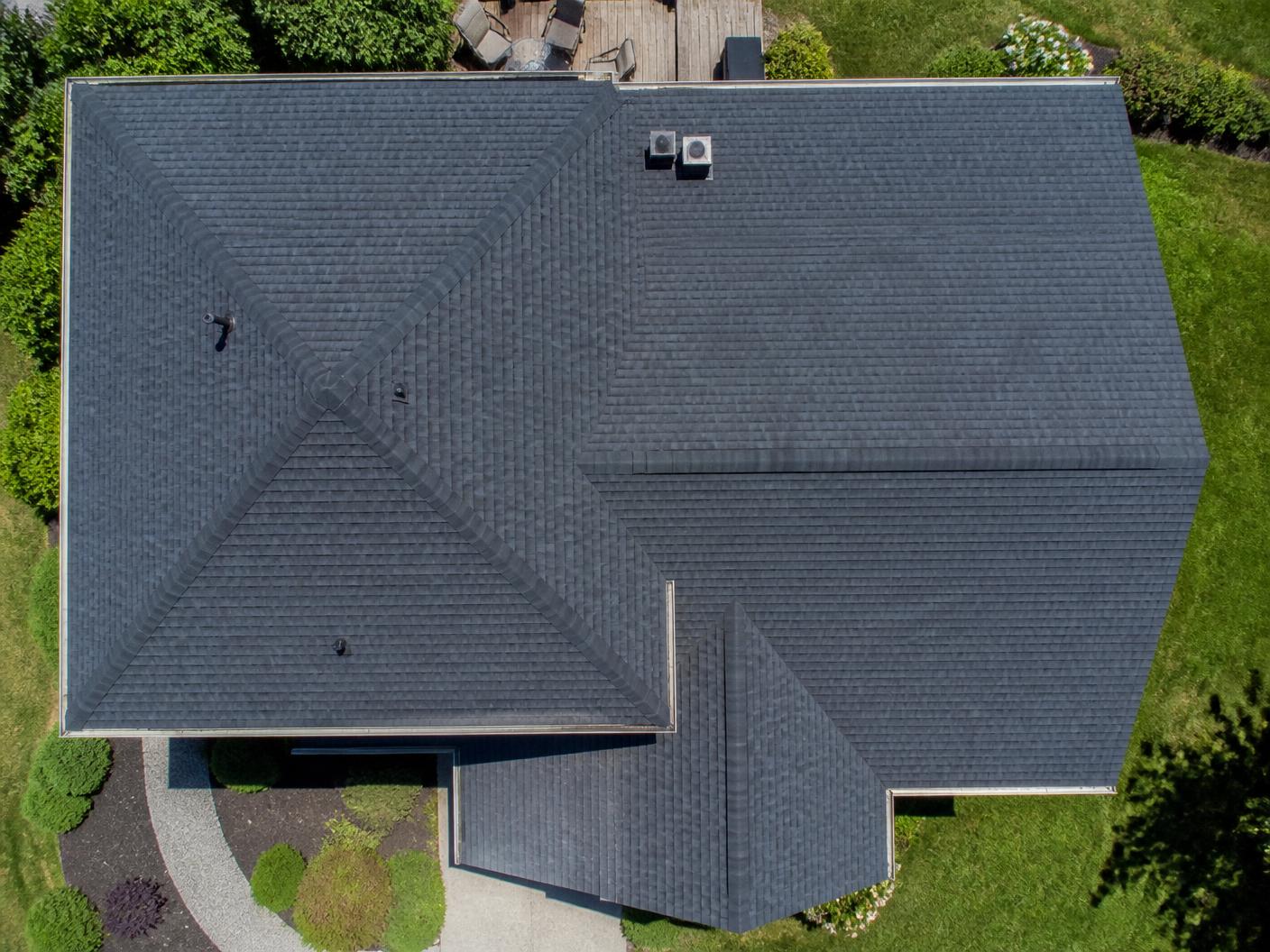 Illustrative aerial photo of a completed residential shingle roof
